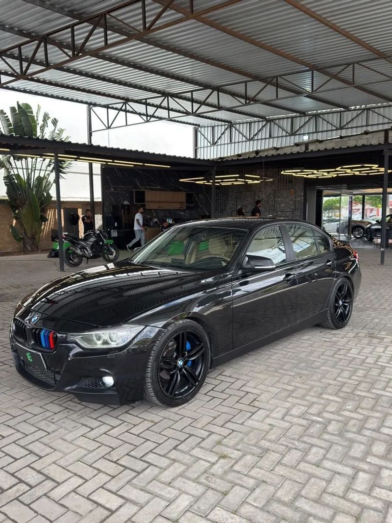 BMW 320i na cor preta, vista dianteira em três quartos
